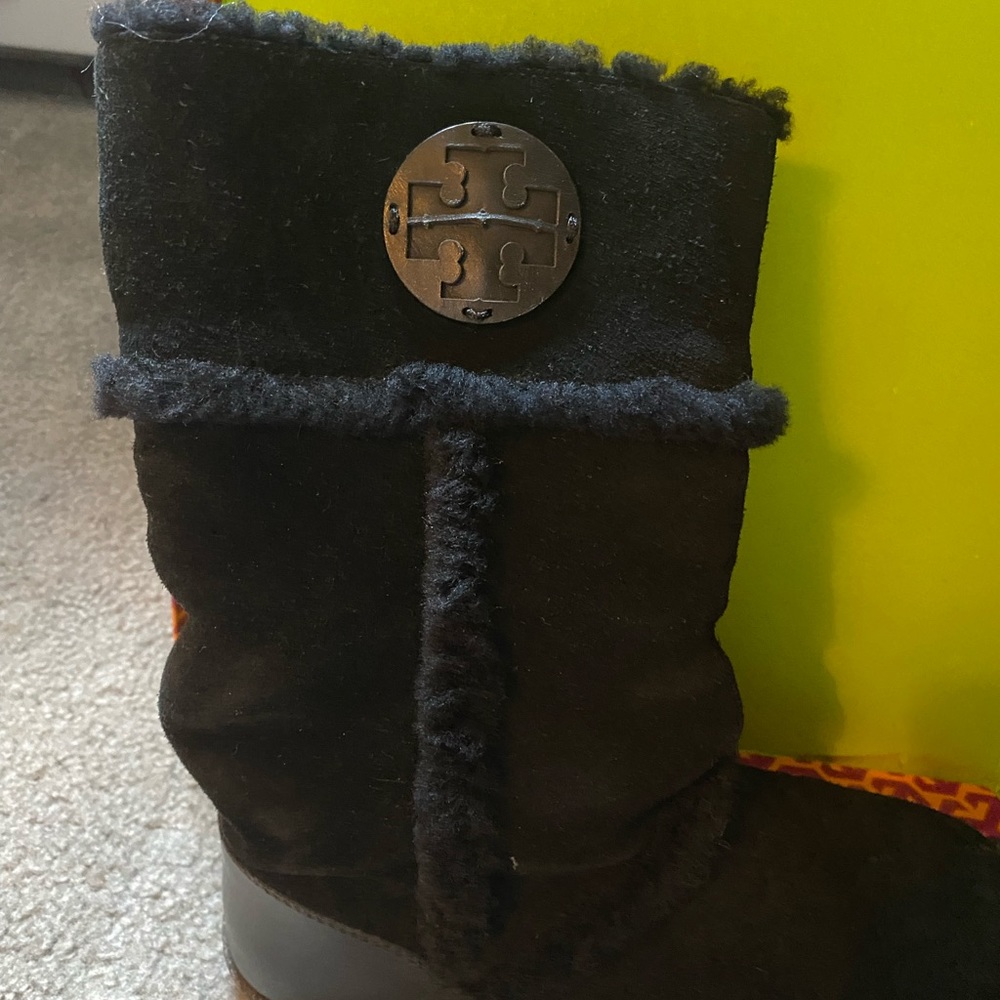 Black suede Tory Burch boots.